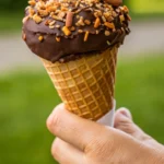 Stacked Homemade Coffee Ice Cream Drumsticks with coffee beans